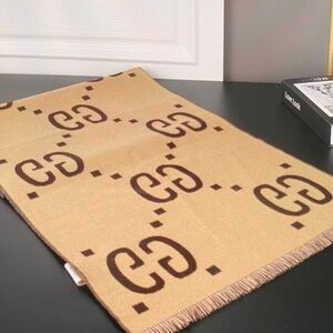 Gucci Tan and Brown Logo Accent